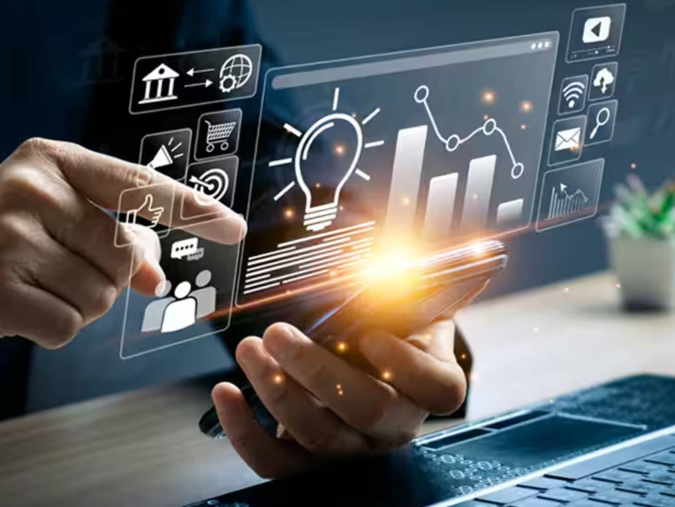 Close-up of a businessman operating holographs depicting technology