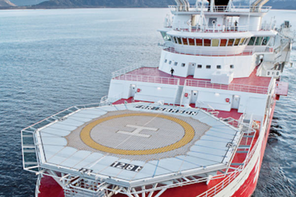 A helipad on a ship in the ocean